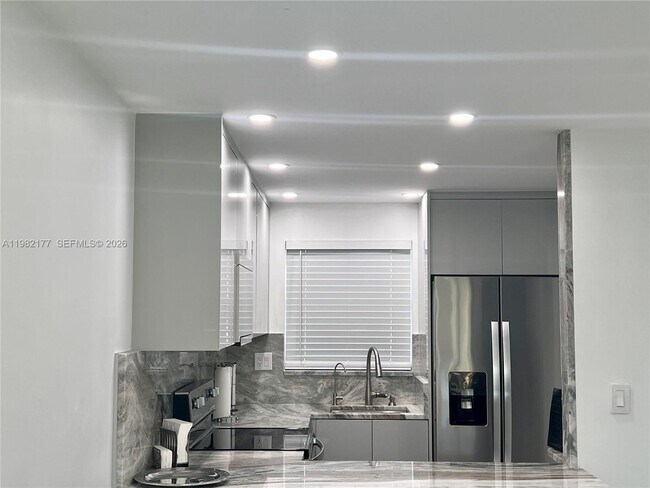 Building Photo - 8595 Sunrise Lakes Blvd