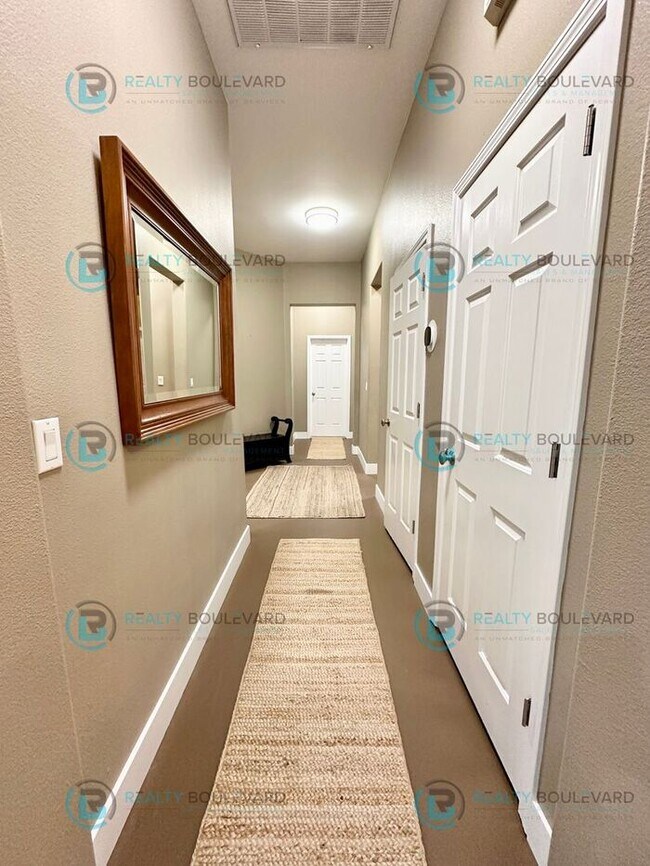 Building Photo - Open Kitchen, Expansive Living, and Covered Patio in Tranquil South Reno Near Trails, Parks & Sho...