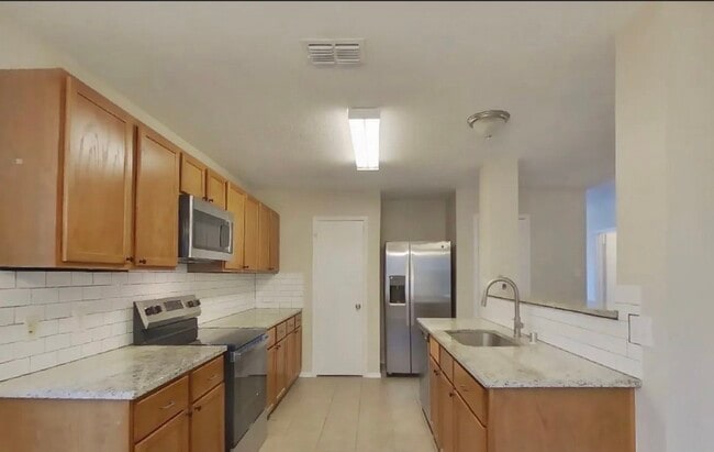 Building Photo - Welcome Home: Beautiful 4-Bedroom Single-Family Gem