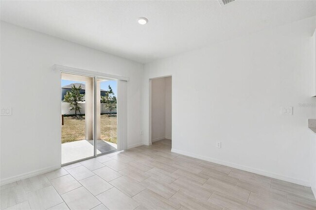 Building Photo - 1712 Tropical Oasis Ave