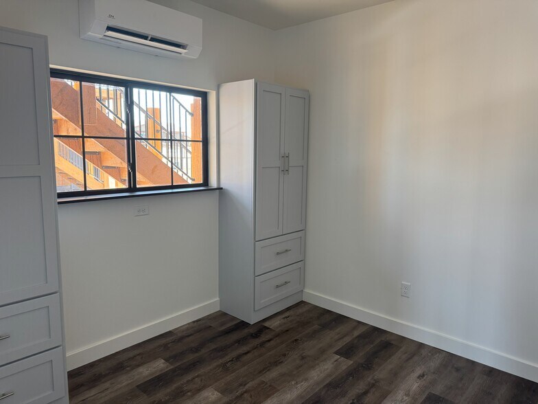 Bed with custom armoires and zone temp control - 102 Second St