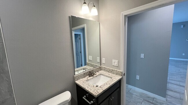 Building Photo - Beautiful 3 Bedroom Palm Bay Home with Upgrades & No Water Bill!