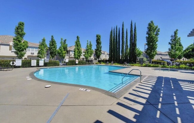Building Photo - Experience Esplanade! Premier Townhome Com...