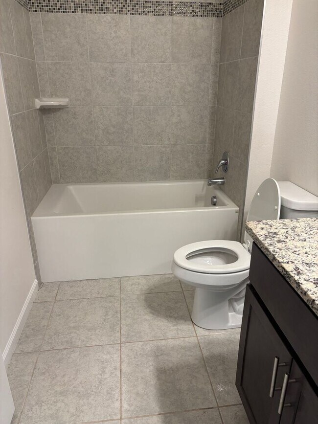 Building Photo - Like New 3 bedroom + den with French doors, screened in porch and Fenced yard and much more...