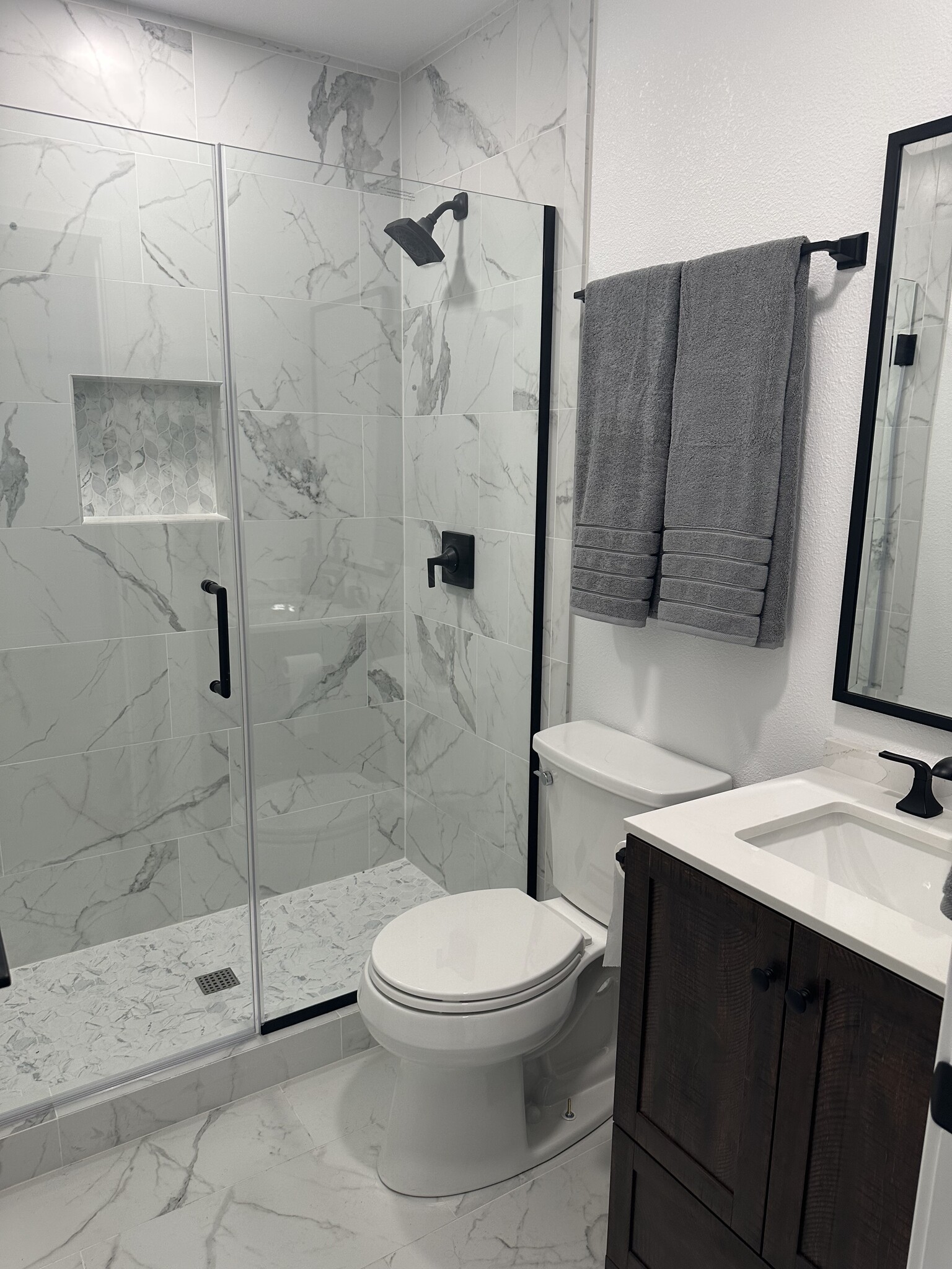 Remodeled bathroom with large walk in shower - 10152 Ascot Cir
