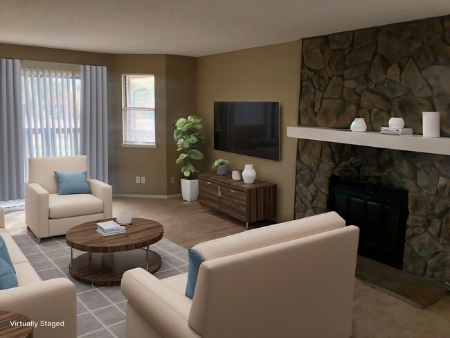 Building Photo - Top-floor Aurora Condominium with New Carpet