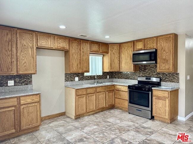 Building Photo - 13787 De Garmo Ave