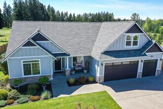Building Photo - Luxury Yelm Estate on ¾ Acre with Custom Outdoor Living, Loft, A/C & Designer Kitchen!