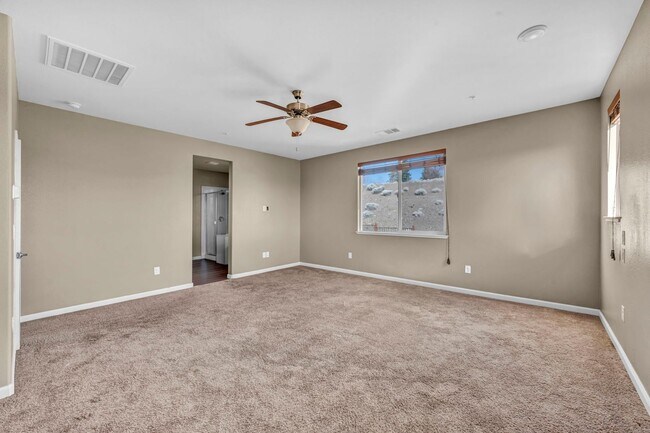 Building Photo - Sun-Filled, Spacious Living with a Three-Car Garage