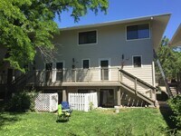 Building Photo - Completely Renovated 2 Bed 1.5 Bath West Pearl Street Condo W/Hiking Trails In Your Backyard.