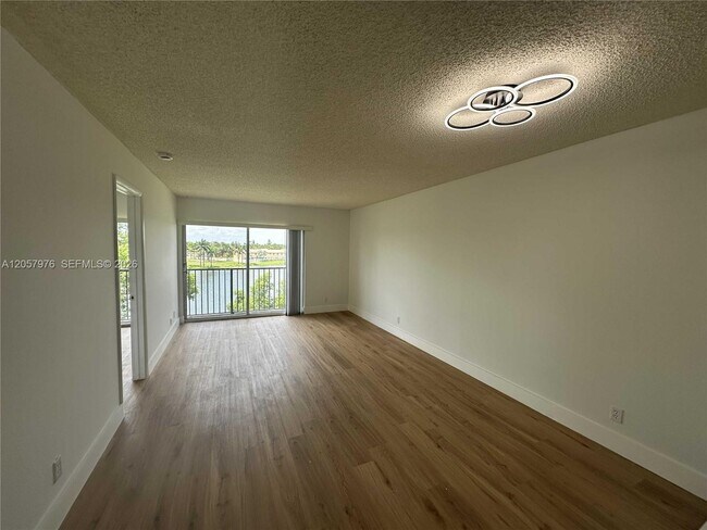 Building Photo - 8560 N Sherman Cir