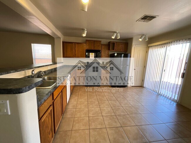 Building Photo - 11580 W Duran Ave