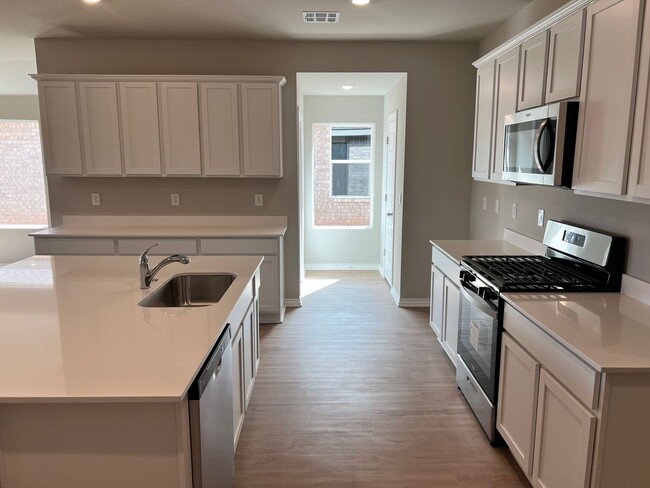 Building Photo - Beautiful Brand New 4 Bedroom Home in Must...