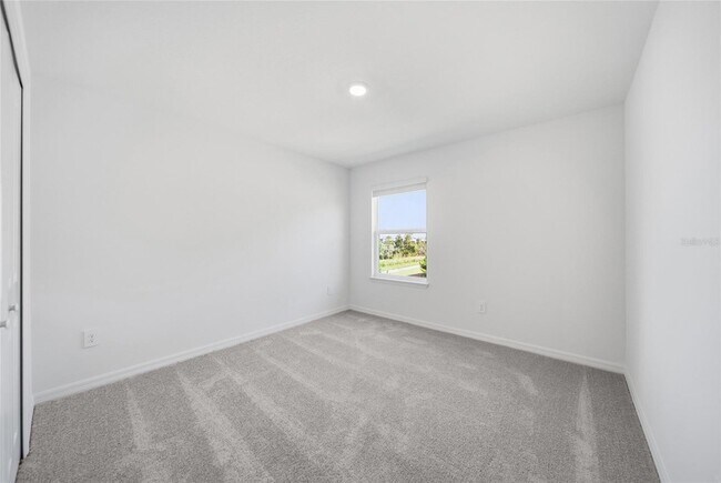 Building Photo - 8879 Coqui Song Ln