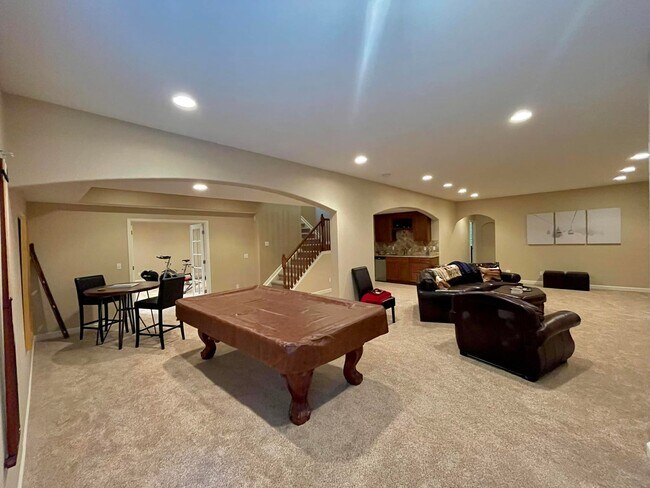 basement living room - 3607 S Xenia St