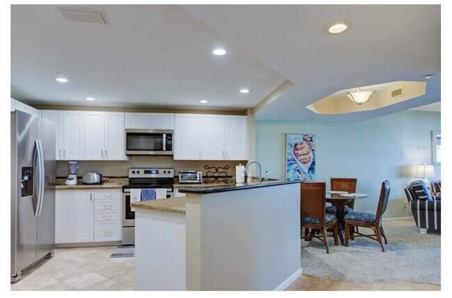 Building Photo - Beachfront Condo with Stunning Views & Resort Amenities Available for the whole month of January!