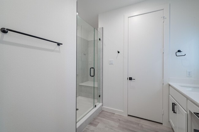 Building Photo - Gated Luxury Townhomes with yard + Roof Patio