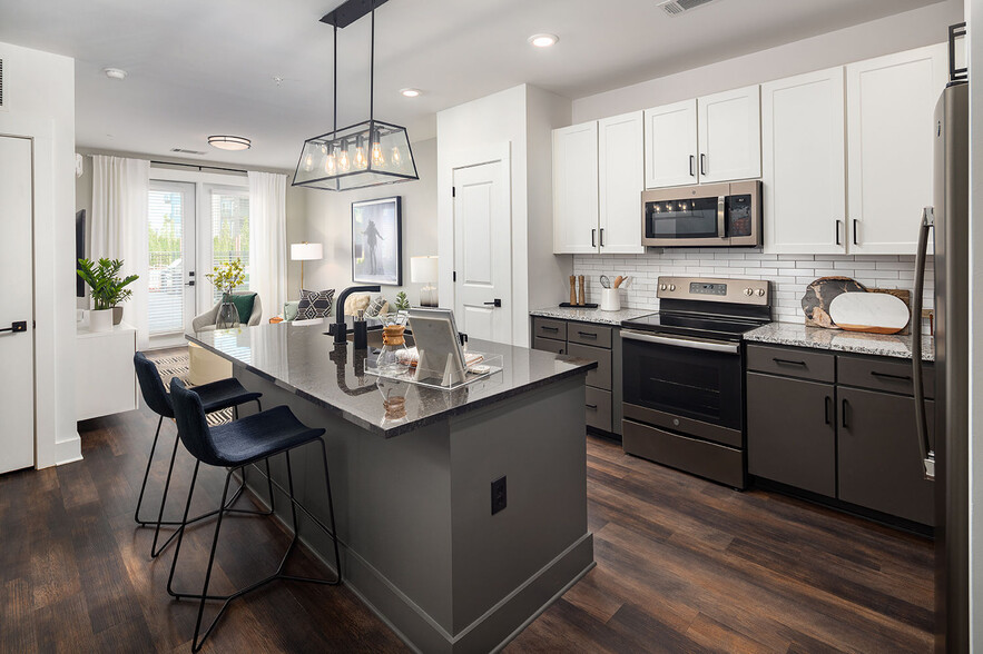 Custom Cabinetry with Under-Cabinet Lighting, Designer Hardware, and Tile Backsplashes - Cortland West Nashville