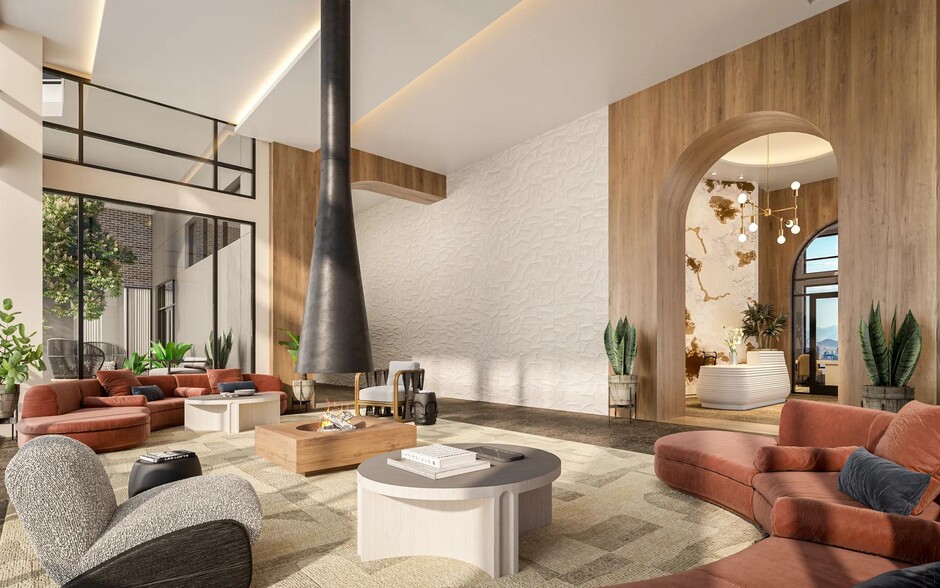 Hotel-inspired lobby lounge with fireplace, comfortable seating, and coffee bar. - Modera Reserve