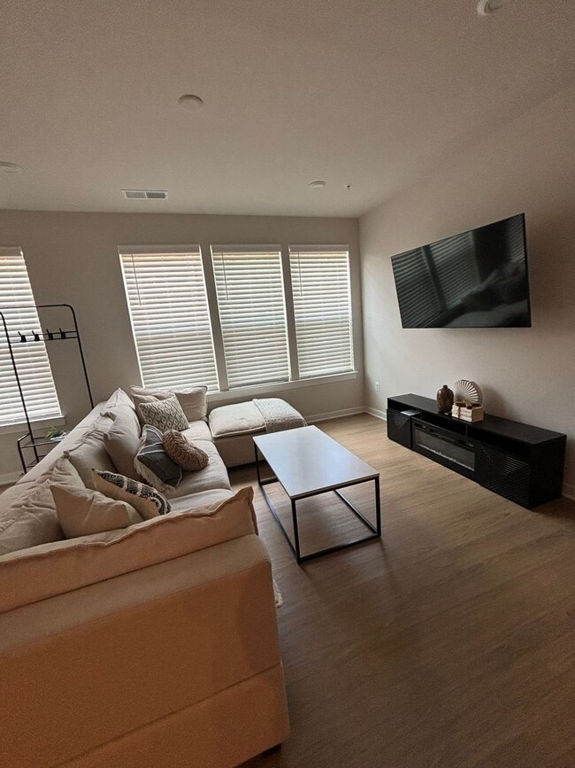 Building Photo - Modern 3BR Condo: Walk to Metro, 3 Miles f...