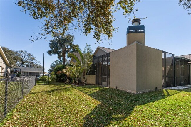 Building Photo - A vibrant 2-bedroom, 2-bathroom tropical retreat designed for both high-energy entertaining and l...
