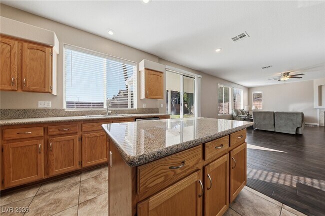 Building Photo - 8061 Yellow Daisy Ave