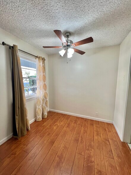dining area attached to living room with view - 715 N Jackson St