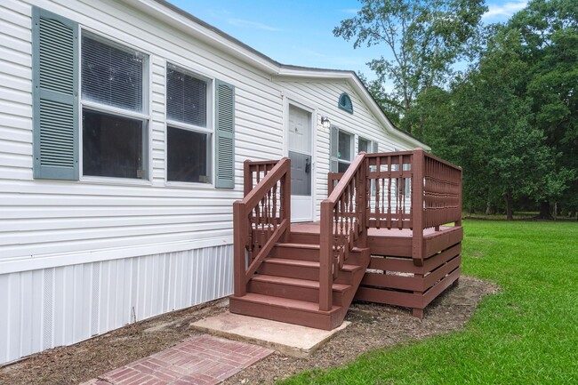 Building Photo - beautifully refreshed 3-bedroom, 2-bath home offering peaceful country living with modern updates!