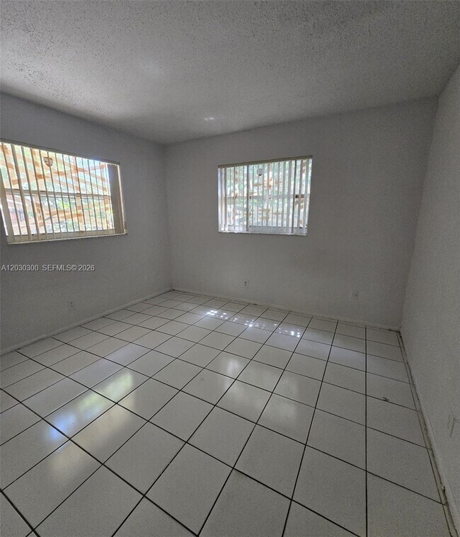 Building Photo - 5880 NW 19th Ct