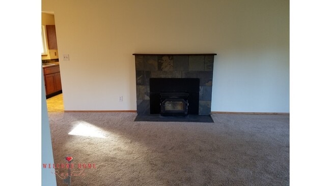 Building Photo - Beautiful Remodeled Rambler!!!  Come enjoy this HUGE backyard!!  NEW CARPET!!
