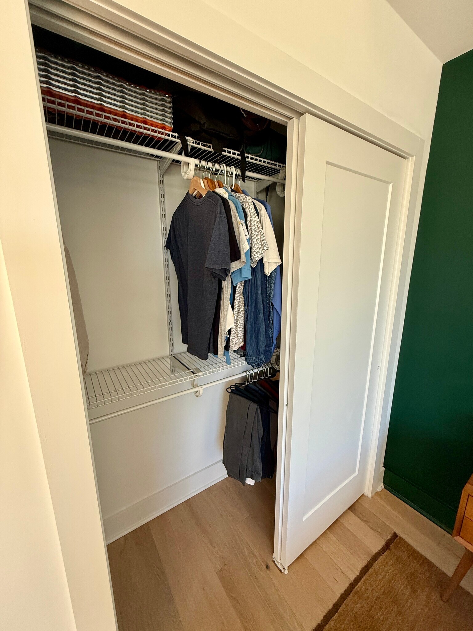 Bedroom closet has a customizable closet system. - 3916 14th St NW