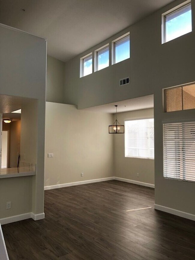 Building Photo - PICTURE PERFECT 2 BR/2 BATH PLUS LOFT END UNIT CONDO WITH DIRECT ACCESS 2 CAR GARAGE