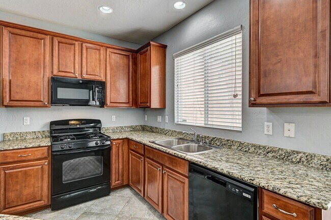 Building Photo - BEAUTIFUL GATED 2 Story, 3 Bedroom Home in...