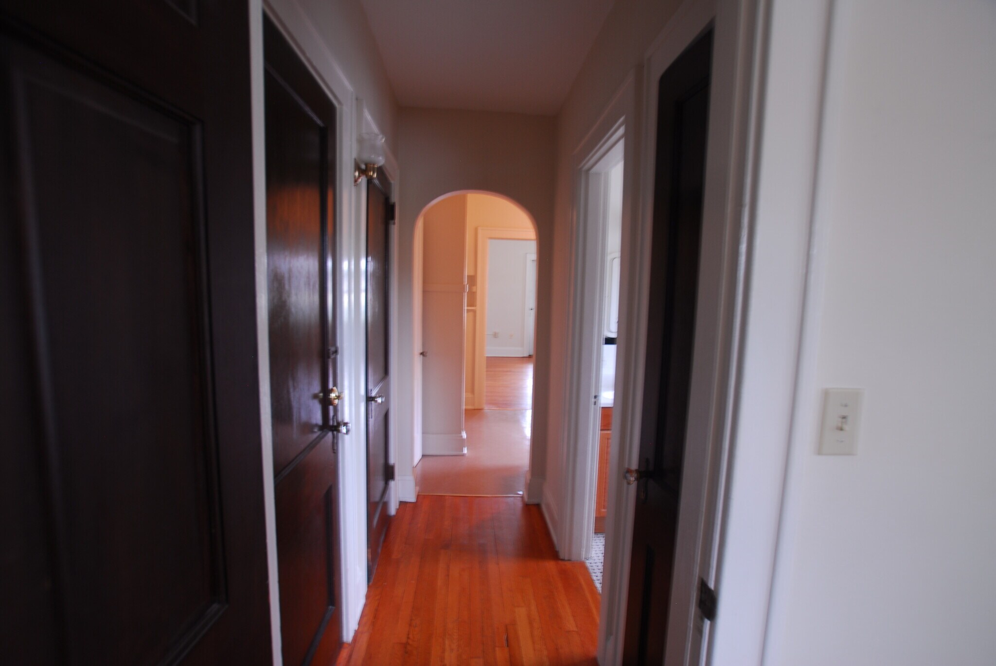 Hallway to bath, bedroom and back entry - 3102 Troy Ave