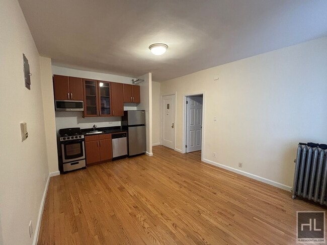 Building Photo - 207-209-209 W 11th St