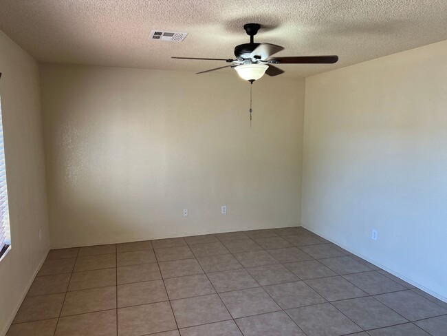 Building Photo - Four Bedroom Mountain View Home with large fenced back yard and double gates