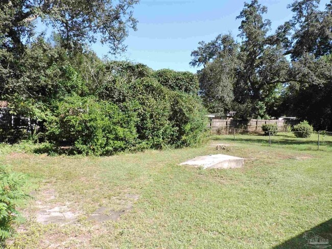 Building Photo - 6970 Woodley Dr