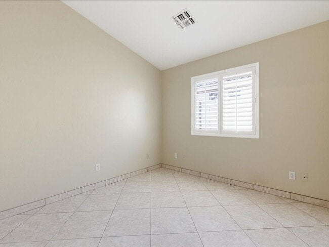 Building Photo - Spacious Living in a Gated Community with Amenities!