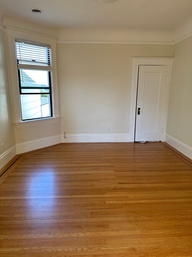 Bedroom # 2, Red Oak refinished hardwood floor. - 1271 10th Ave