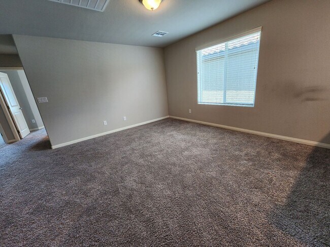 Building Photo - A Fairly New Home with 5 Bedrooms in a gated community