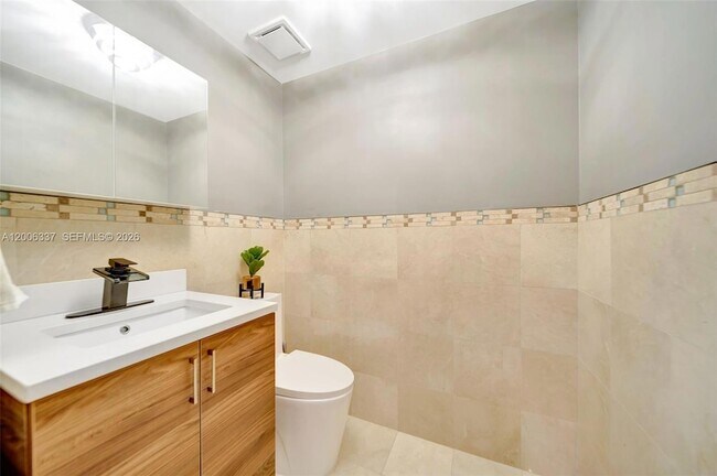 Building Photo - 6051 N Ocean Dr