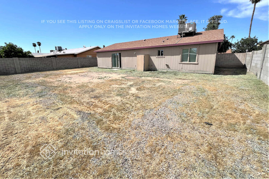 Building Photo - 6827 W Lewis Ave
