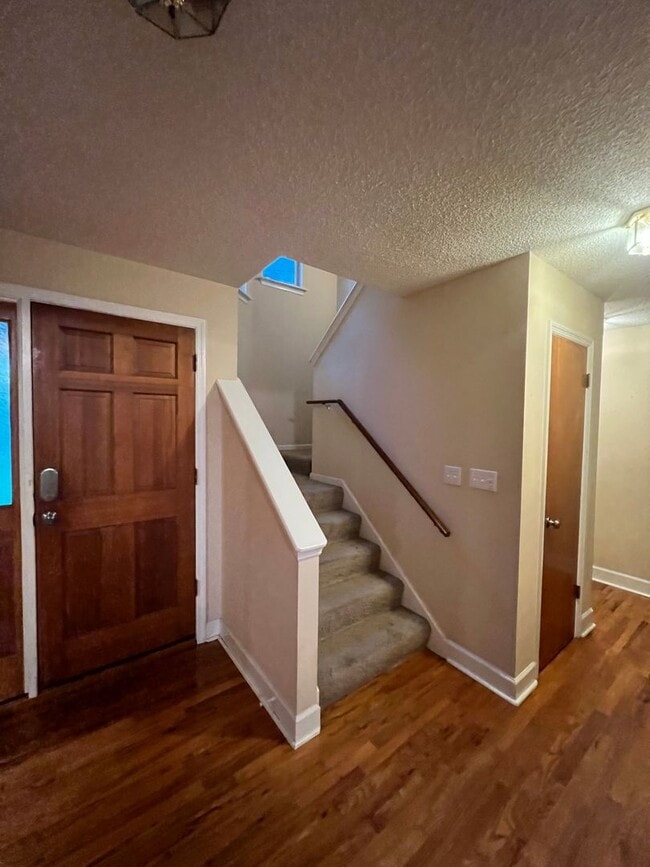 Building Photo - Massive 3 Bedroom 2.5 Bathroom Single-Family Home with Real Hardwood Floors and a Huge Two-Car Ga...