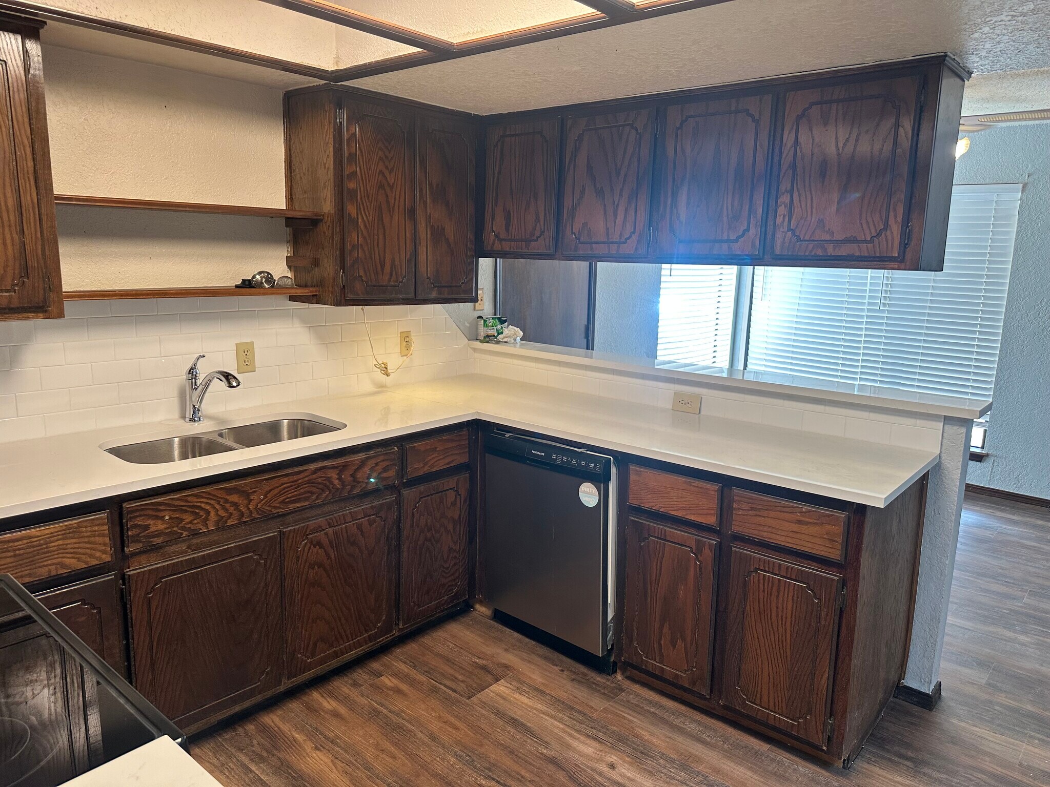 Kitchen with new countertops, sink and faucet - 6107 Gaelic Glen Dr
