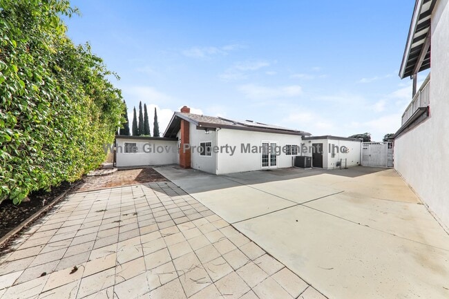 Building Photo - Spacious 4-Bedroom Tustin Home with Solar, Citrus Trees & Gas Fireplace