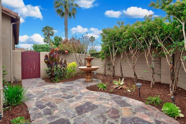 Building Photo - Gated corner lot home walking distance to the beach