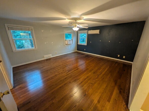 2nd Floor Larger Bedroom (West) with Large Walk-in Closet. Newly refinished hardwoods. - 4515 West 72nd Terrace
