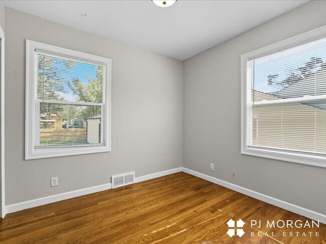 Building Photo - Stylish Updates + Spacious Yard + 2-Car Ga...