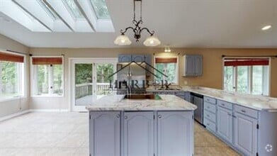 Building Photo - Single Family Home with Vaulted Ceilings!