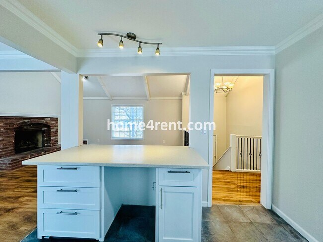 Building Photo - A Lovely Four Bedroom Home in Lenexa w/ Wood Floors, Finished Basement and a Fenced Yard!